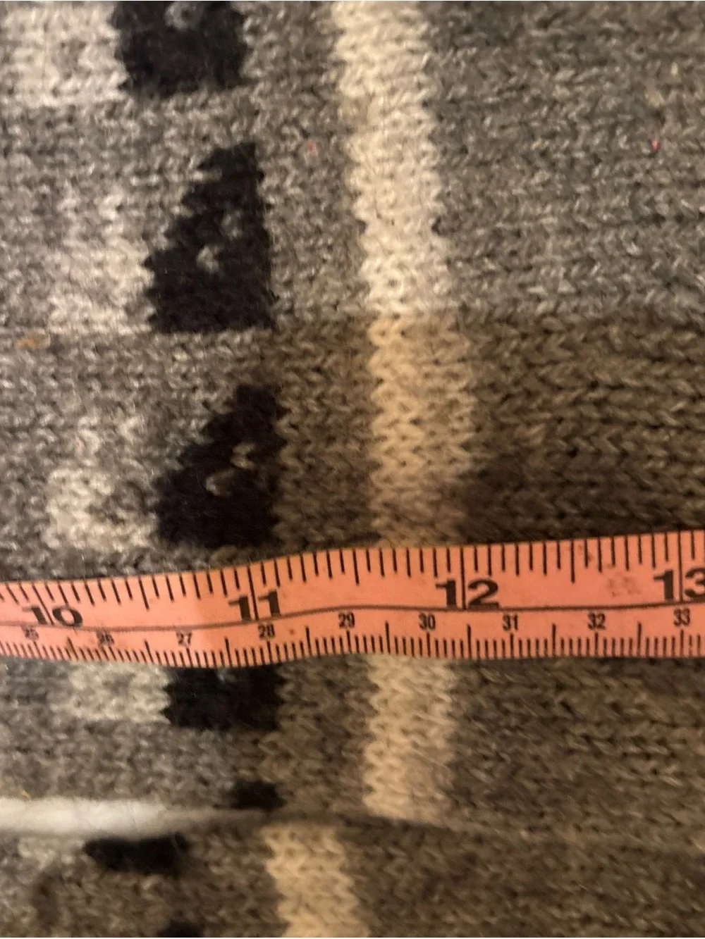 Hand knit alpaca wool for indoor slipper socks in grey, black and white.